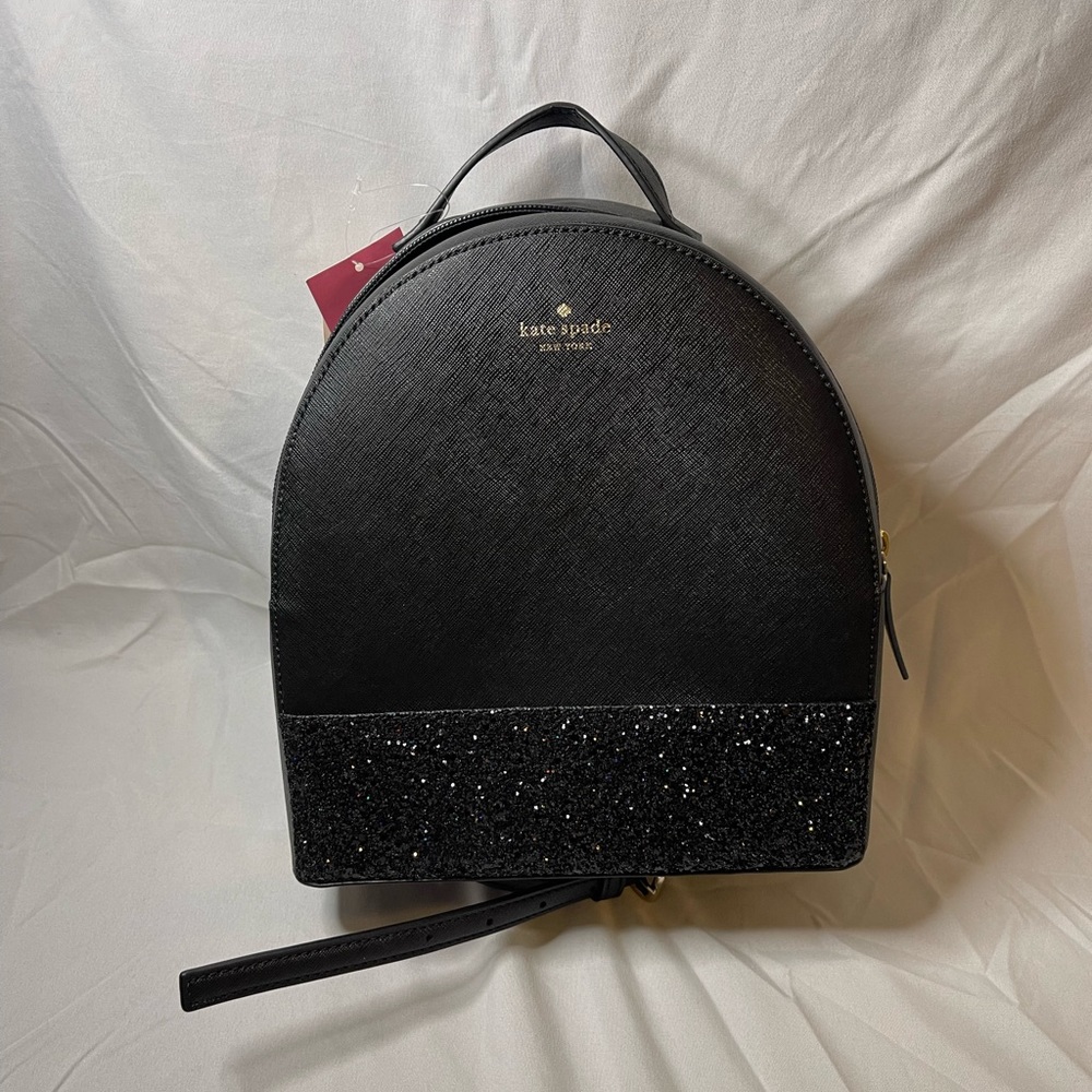 Black Kate Spade backpack with glitter accent